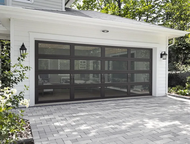 Avon Garage Door Repair design specialist presenting custom garage door options to Avon homeowner