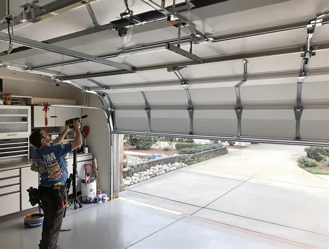 Garage door track repair service by Avon Garage Door Repair in Avon